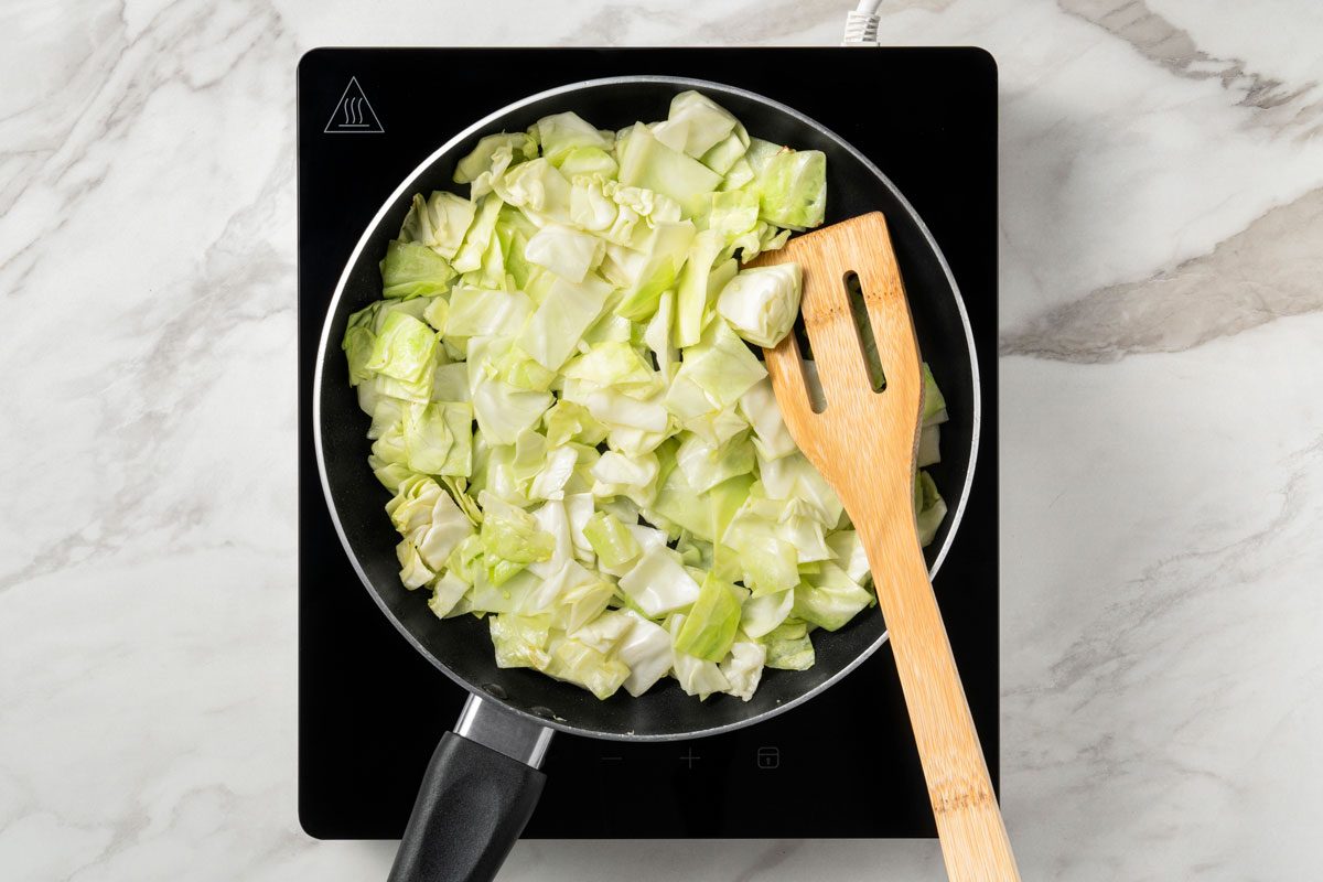 stir-fry cabbage until soft;