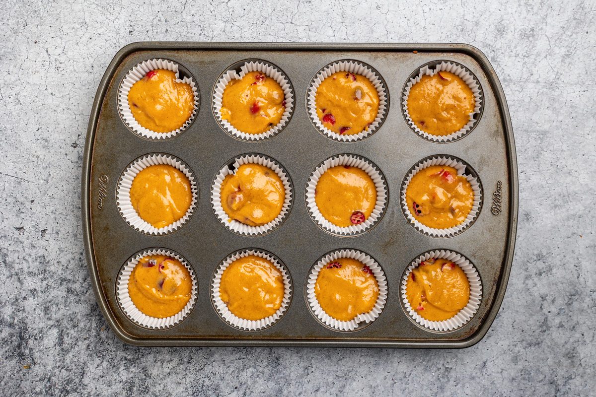 muffin cups filled three-fourths full of batter