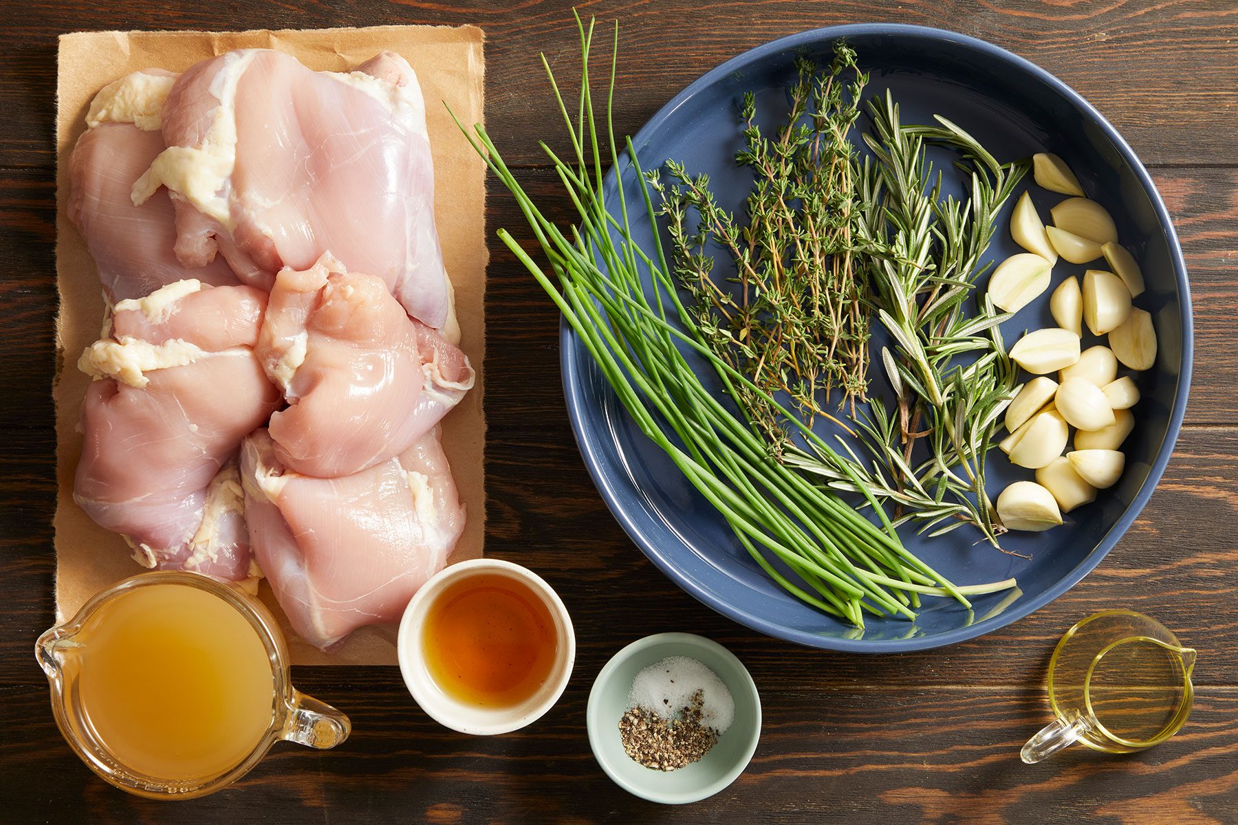 Garlic Herb Chicken Ingredients in plates and bowls.